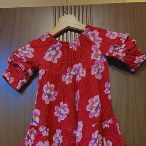 Redshirt with purple flowers